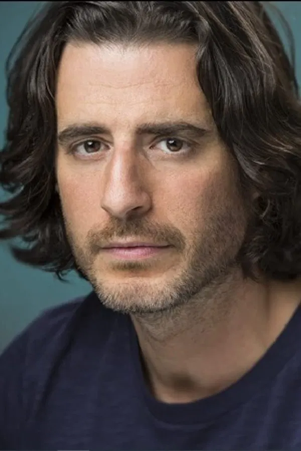 Jonathan  Roumie